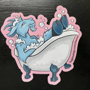 Cartoon goat relaxing in a pink bathtub with bubbles.